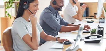 Shot of a group of businesspeople working in a call centre.